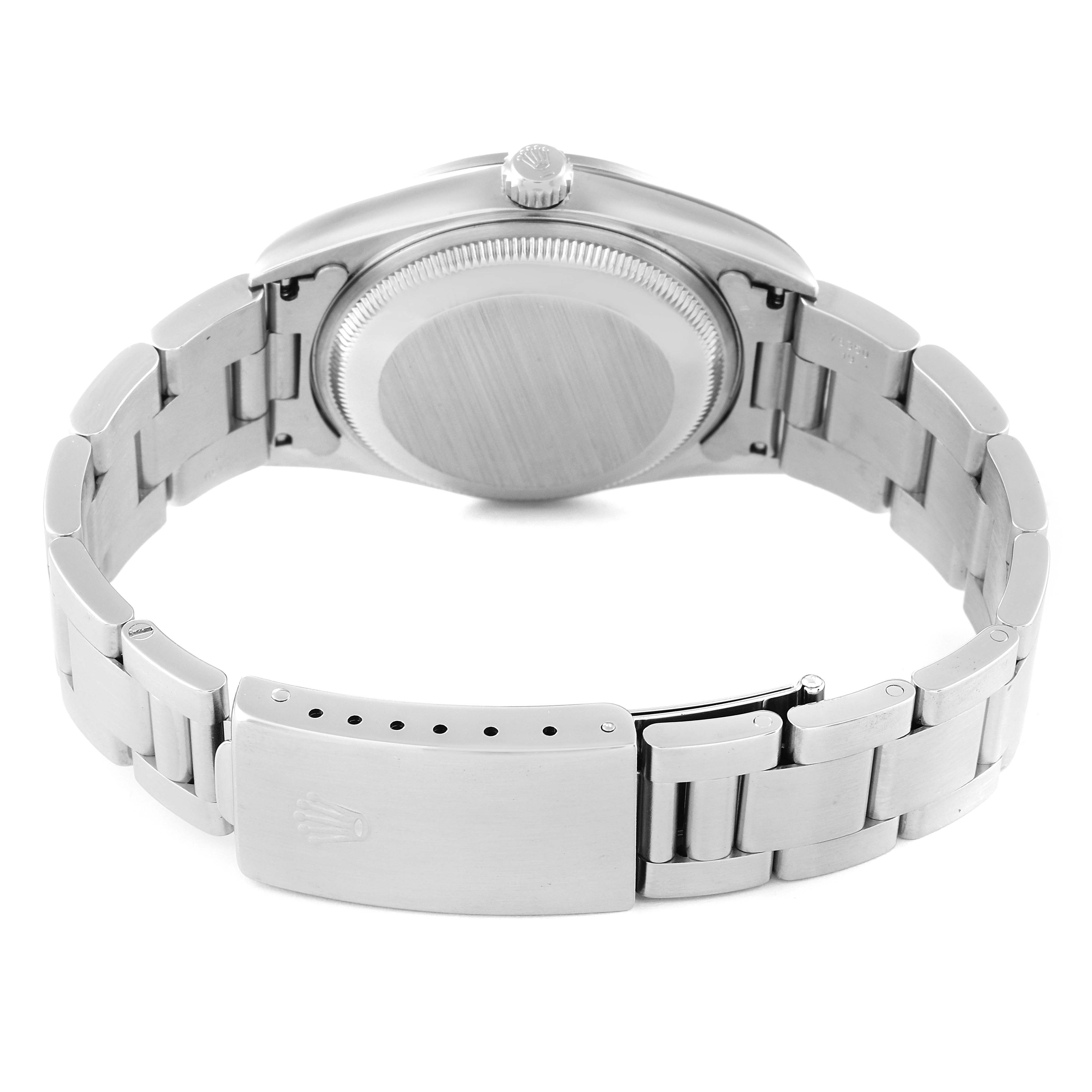 The image shows the back view of a Rolex Date 15200 Men's Stainless Steel Pink Dial 15200 Men's Stainless Steel Pink Dial model watch, highlighting the clasp, bracelet, and case back.