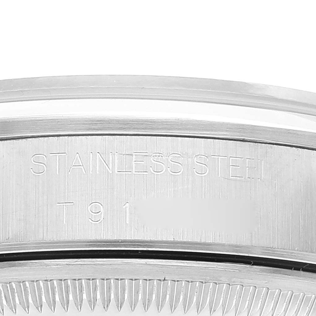 This image shows an angled close-up of the stainless steel case and etched details on a Rolex Date 15200 Men's Stainless Steel Pink Dial 15200 Men's Stainless Steel Pink Dial model watch.