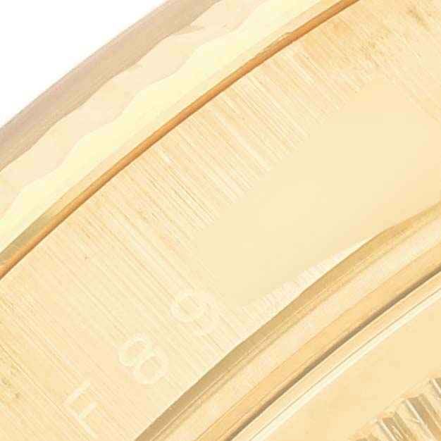 This image shows a close-up angle of the bezel and partial dial of the Rolex President 118238 Men's Yellow Gold Mother of Pearl Dial 118238 Men's Yellow Gold Mother of Pearl Dial model watch.