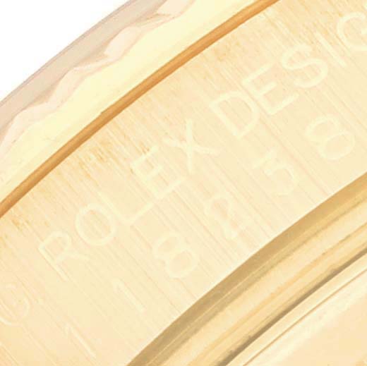 The image shows a close-up view of the engraved inner bezel of a Rolex President 118238 Men's Yellow Gold Mother of Pearl Dial 118238 Men's Yellow Gold Mother of Pearl Dial model watch.