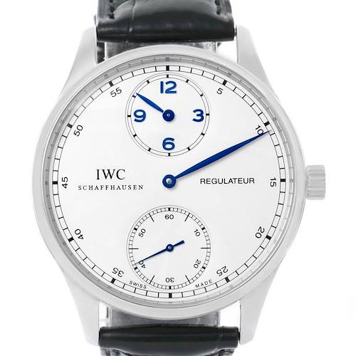 The image shows a front view of an IWC Portuguese IW544401 Men's Stainless Steel Silver Dial IW544401 Men's Stainless Steel Silver Dial Regulateur watch, highlighting its white dial with blue hands and black leather strap.