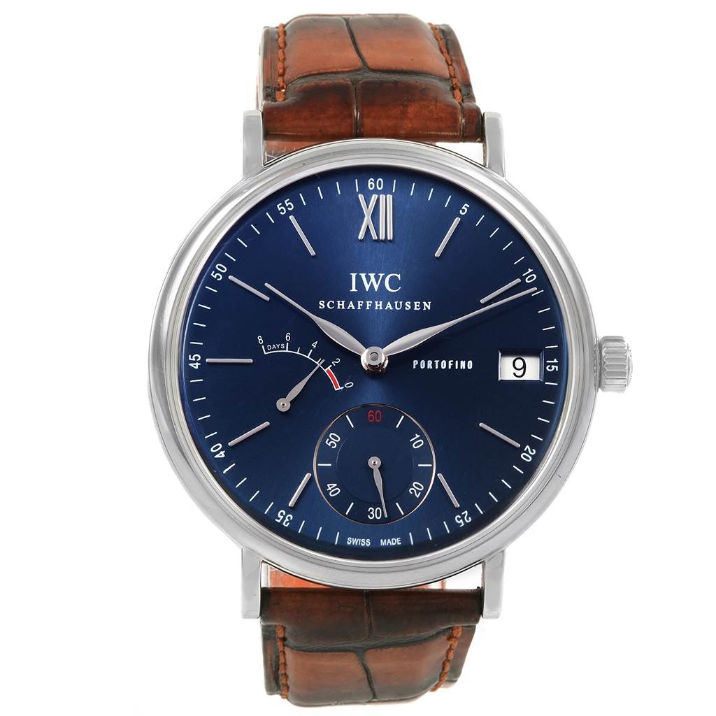 The image shows a front view of the IWC Portofino IW510106 Men's Stainless Steel Blue Dial IW510106 Men's Stainless Steel Blue Dial watch, displaying its blue dial, date window, and brown leather strap.