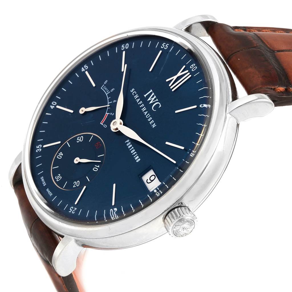 The image shows a front and side view of the IWC Portofino IW510106 Men's Stainless Steel Blue Dial IW510106 Men's Stainless Steel Blue Dial watch, displaying its blue dial, subdials, crown, and brown leather strap.