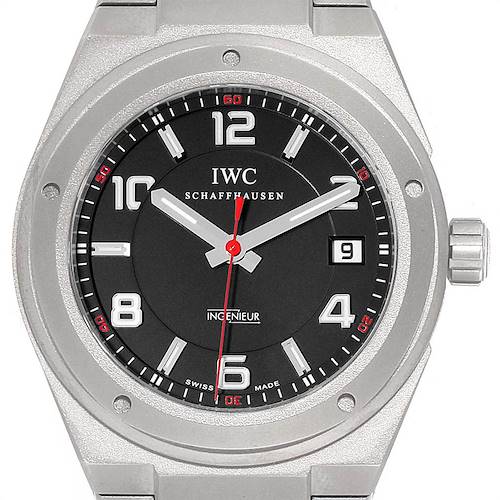 The image shows a front view of the IWC Ingenieur IW322702 Men's Titanium Black Dial IW322702 Men's Titanium Black Dial watch, highlighting its face, bezel, and crown.