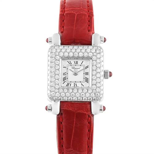 The image shows a frontal view of the Chopard 419-1 Women's White Gold White Dial 419-1 Women's White Gold White Dial Happy Sport 419-1 with a square diamond-studded 18K white gold case and a red strap.