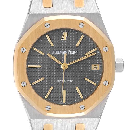 This image shows a front view of the dial and bezel of an Audemars Piguet Royal Oak 14790SA.OO.0789SA.01 Men's Steel and Gold (two tone) Grey Dial 14790SA.OO.0789SA.01 Men's Steel and Gold (two tone) Grey Dial watch, highlighting the date window and brand logo.