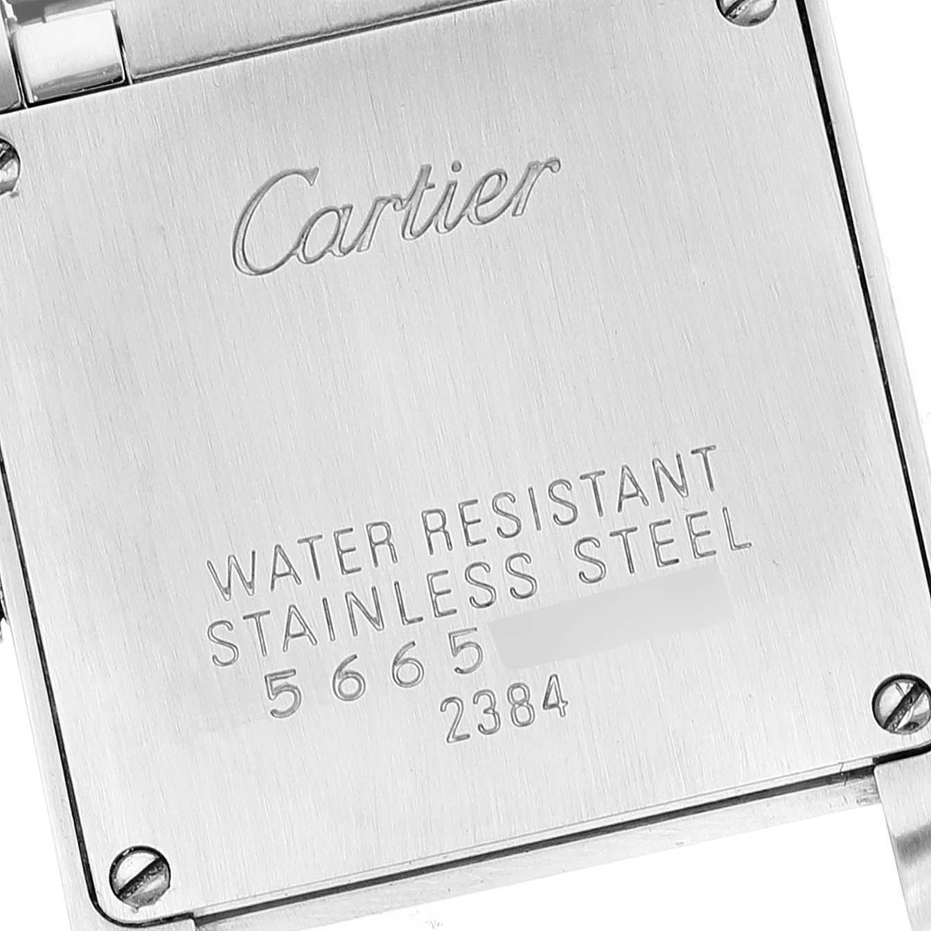 The image shows the back case of the Cartier Tank Francaise Steel Rose Gold Mother of Pearl Ladies Watch W51027Q4, displaying engravings on the case.