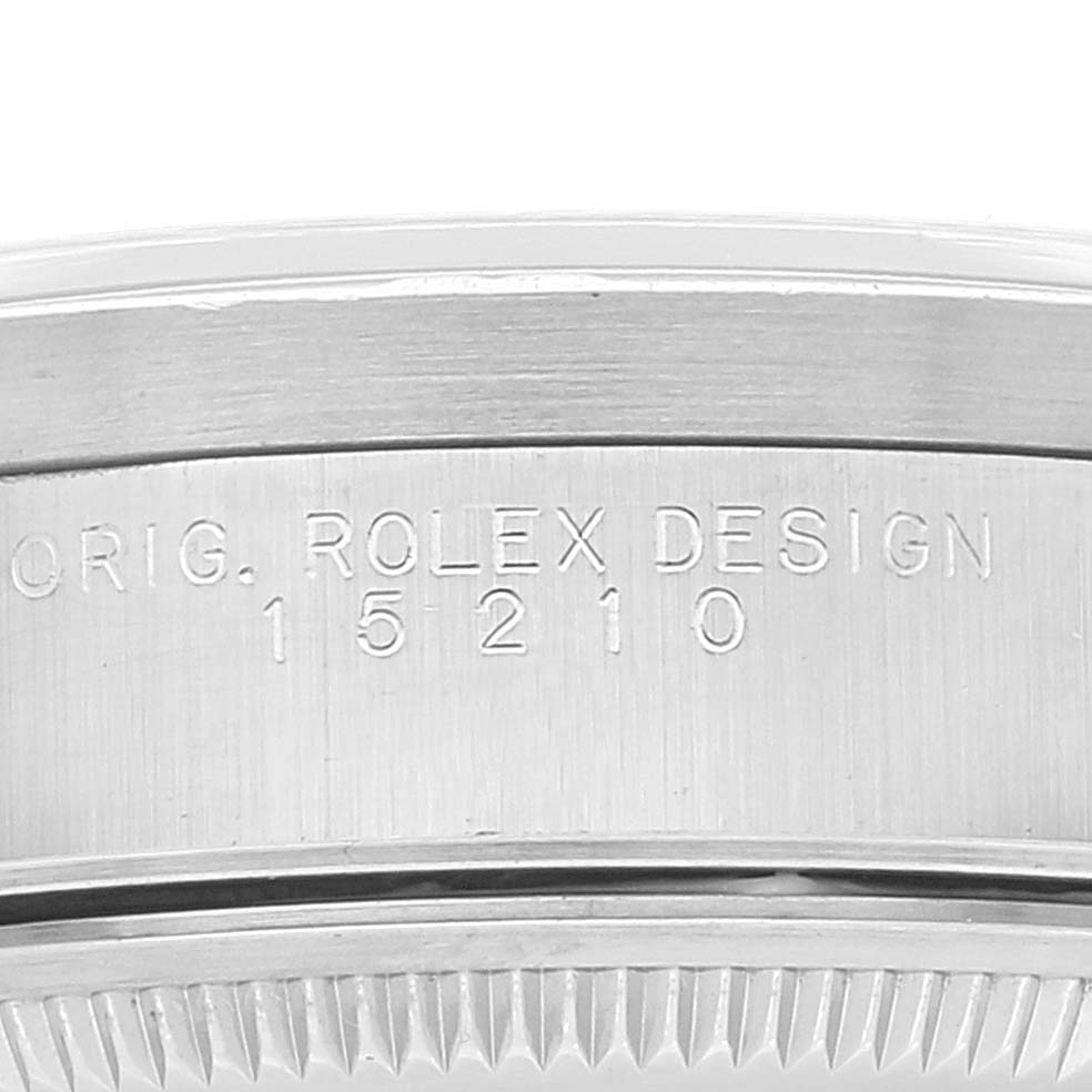 The image shows a close-up of the case back of a Rolex Date 15210 Men's Stainless Steel White Dial 15210 Men's Stainless Steel White Dial model, featuring the engraved model number "15210".