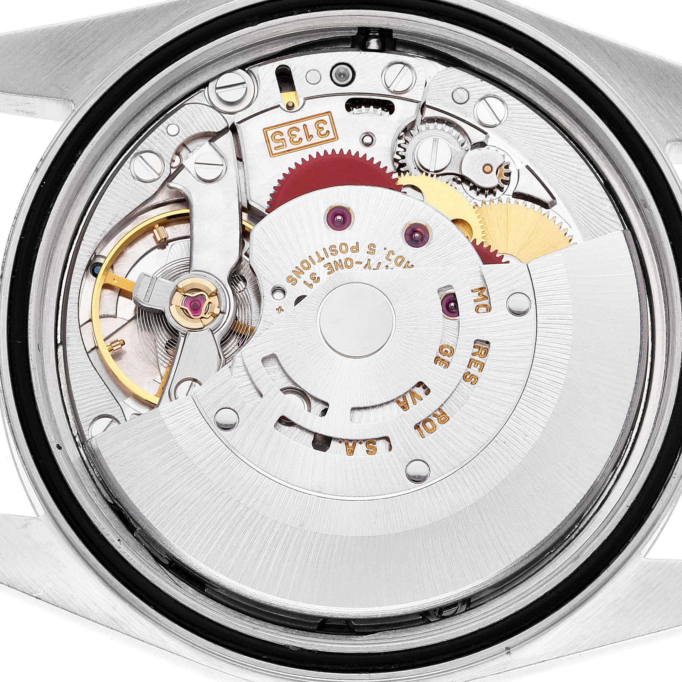 The image shows a close-up view of the movement mechanisms inside the Rolex Datejust 16234 Men's Stainless Steel Silver Dial 16234 Men's Stainless Steel Silver Dial watch model from the back.