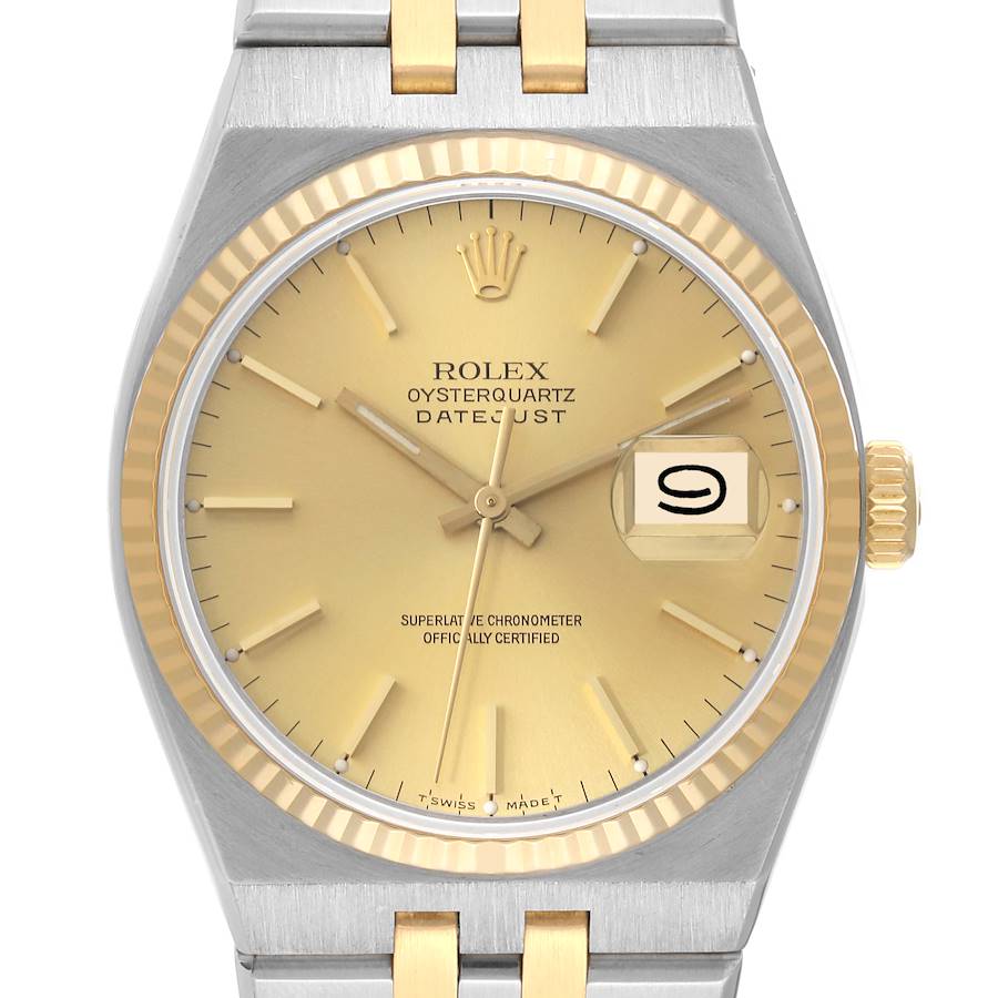 The image shows a frontal view of the Rolex Oysterquartz 17013 Men's Steel and Gold (two tone) Champagne Dial 17013 Men's Steel and Gold (two tone) Champagne Dial Datejust watch, featuring its dial, hands, crown, and part of the bracelet.