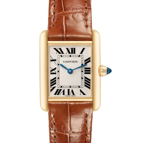 The image shows a frontal view of the Tank Louis Cartier watch, highlighting its brown leather strap, rectangular dial, and gold casing.