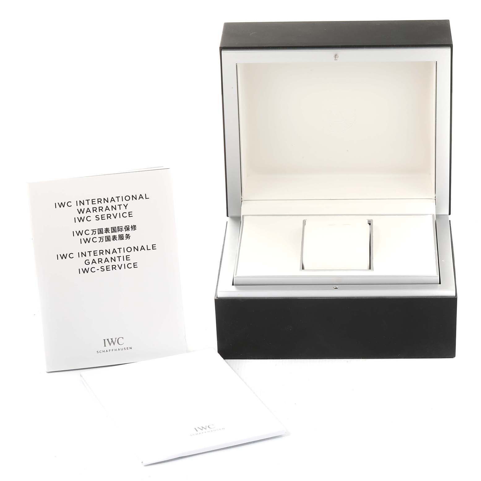 The image shows the open box and warranty booklets for the IWC Portuguese IW390212 Men's Titanium Black Dial IW390212 Men's Titanium Black Dial watch.
