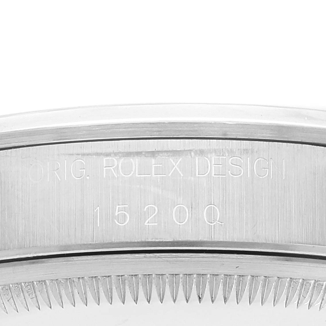 The image shows a close-up of the case number engraving on the side of a Rolex Date 15200 Men's Stainless Steel Black Dial 15200 Men's Stainless Steel Black Dial model watch.