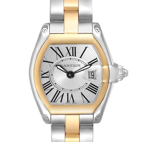 The Cartier Roadster W62026Y4 Women's Steel and Gold (two tone) Silver Dial watch is shown from a front angle, highlighting its dial, Roman numerals, date window, and two-tone bracelet.