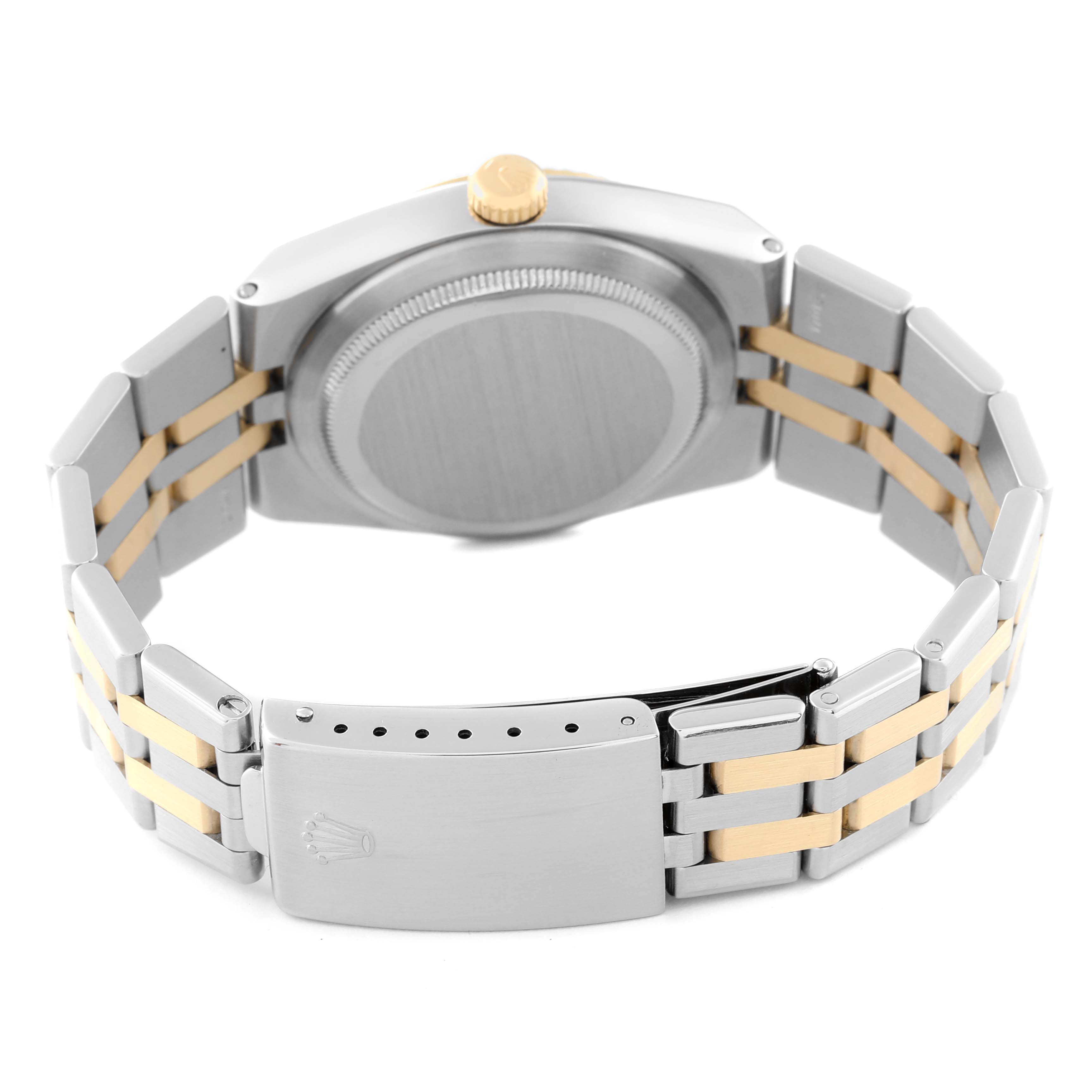 This image shows the back view of a Rolex Oysterquartz 17013 Men's Steel and Gold (two tone) White Dial 17013 Men's Steel and Gold (two tone) White Dial watch, highlighting the case, crown, and two-tone bracelet with clasp.