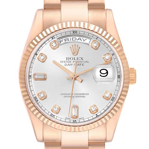 The Rolex Date 118235 Men's Rose Gold Silver Dial model is shown from the front, highlighting the dial, fluted bezel, hands, diamond hour markers, and day-date windows.