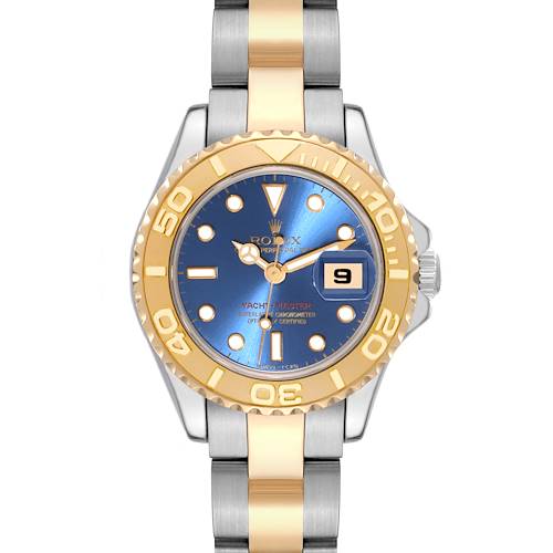 This image shows a Rolex Yacht-Master 69623 Women's Steel and Gold (two tone) Blue Dial 69623 Women's Steel and Gold (two tone) Blue Dial watch from a front angle, featuring a blue dial, date window, and two-tone metal bracelet.