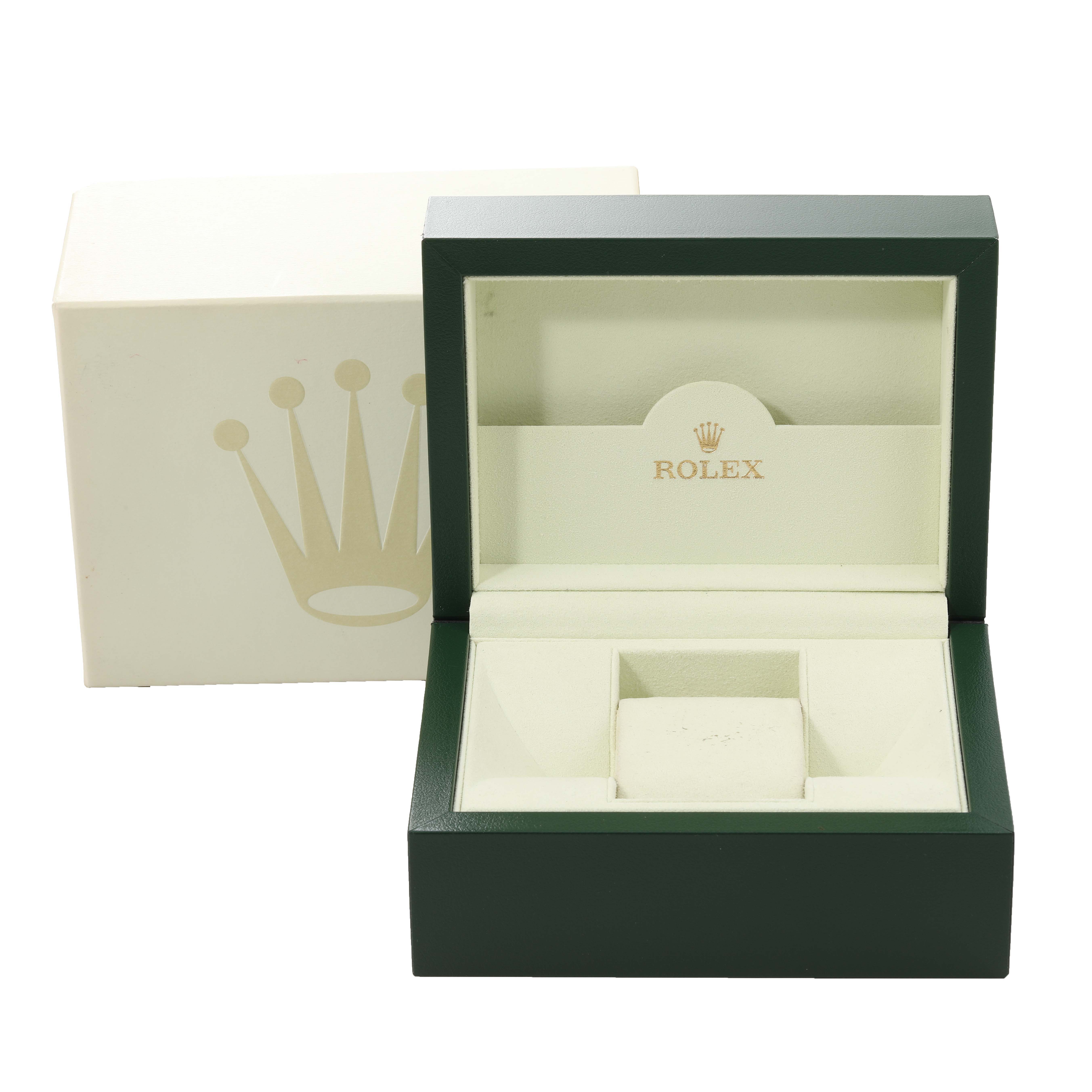 The image shows a Rolex box for the Datejust model, with the box lid open and the inner cushion exposed.