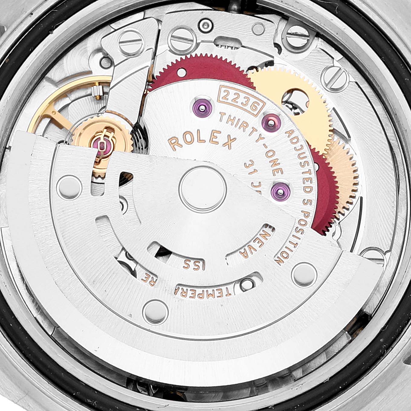This is a close-up view of the internal mechanism of a Rolex Datejust 279174 Women's Stainless Steel Mother of Pearl Dial 279174 Women's Stainless Steel Mother of Pearl Dial watch, showcasing its intricate gears and components.