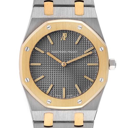 This image shows a frontal view of the Audemars Piguet Royal Oak 56303SA Men's Steel and Gold (two tone) Grey Dial 56303SA Men's Steel and Gold (two tone) Grey Dial watch, focusing on its dial, bezel, and part of the bracelet.