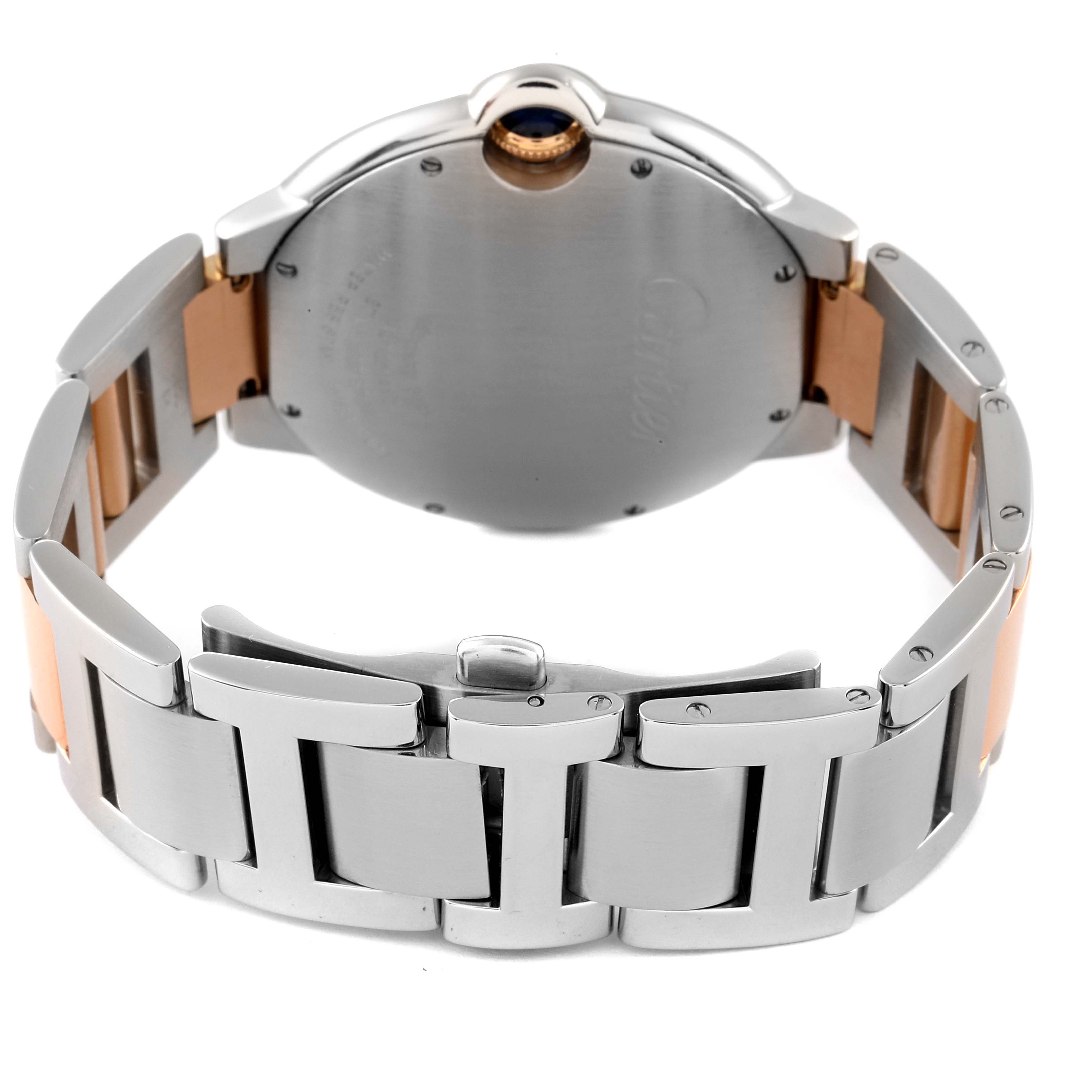 The image shows the back and bracelet of a Ballon Bleu de Cartier watch, displaying its stainless steel and gold two-tone design.