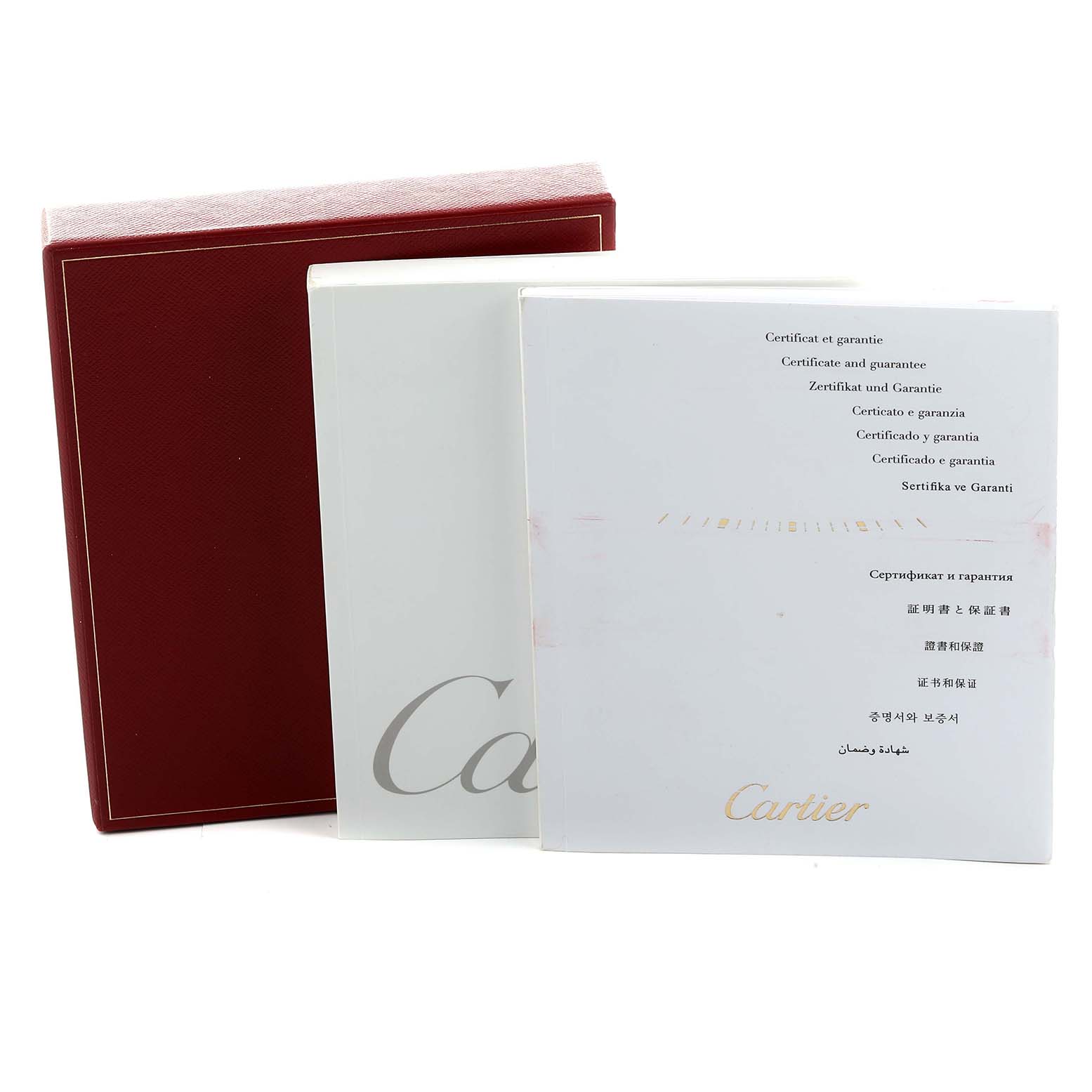 The image shows the documentation and packaging for a Cartier Tank Louis W1529756 Men's Yellow Gold Silver Dial watch, including a red box and warranty papers.