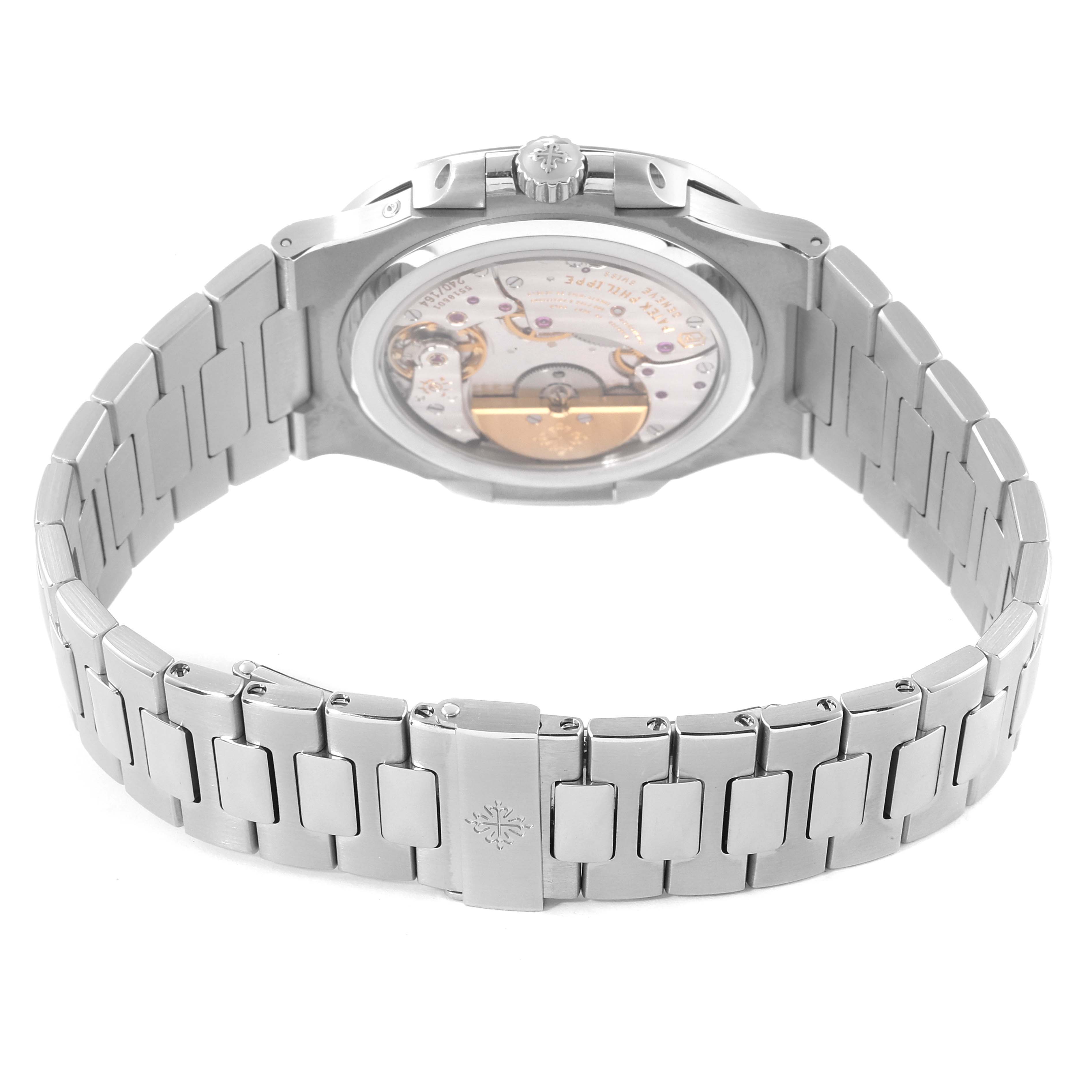 The Nautilus Patek Philippe watch is shown from the back, highlighting its open case back and stainless steel bracelet.
