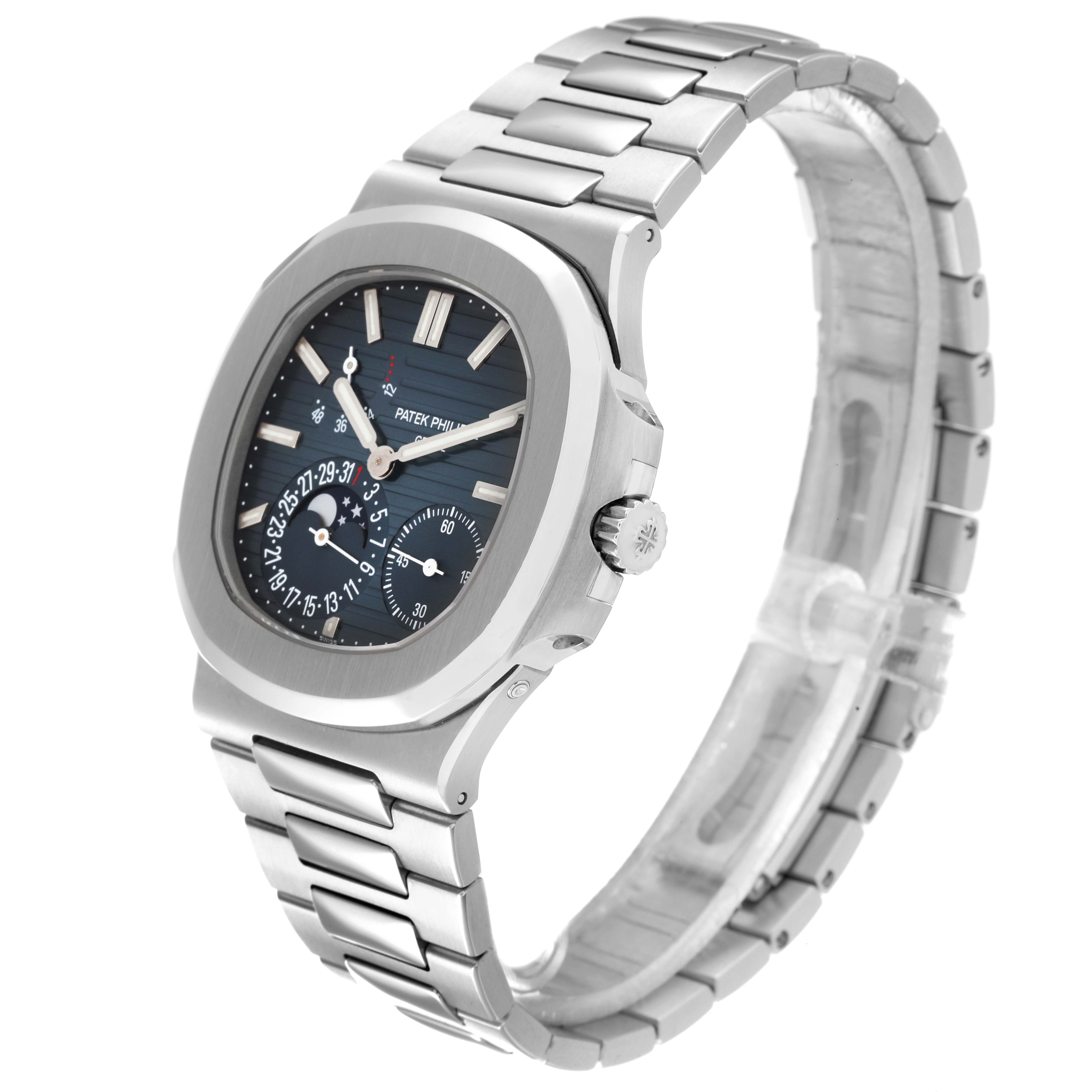 This image shows a Patek Philippe Nautilus 5712/1A-001 Men's Stainless Steel Blue Dial 5712/1A-001 Men's Stainless Steel Blue Dial watch from an angled side view, highlighting its face and bracelet.