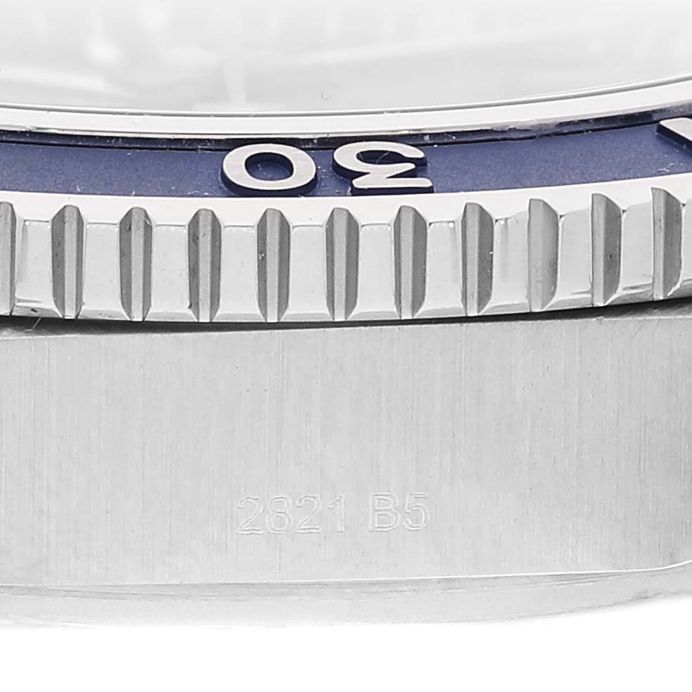 The image shows a close-up of the bezel and side case of a Breitling Superocean A17367 Men's Stainless Steel Blue Dial A17367 Men's Stainless Steel Blue Dial model watch.