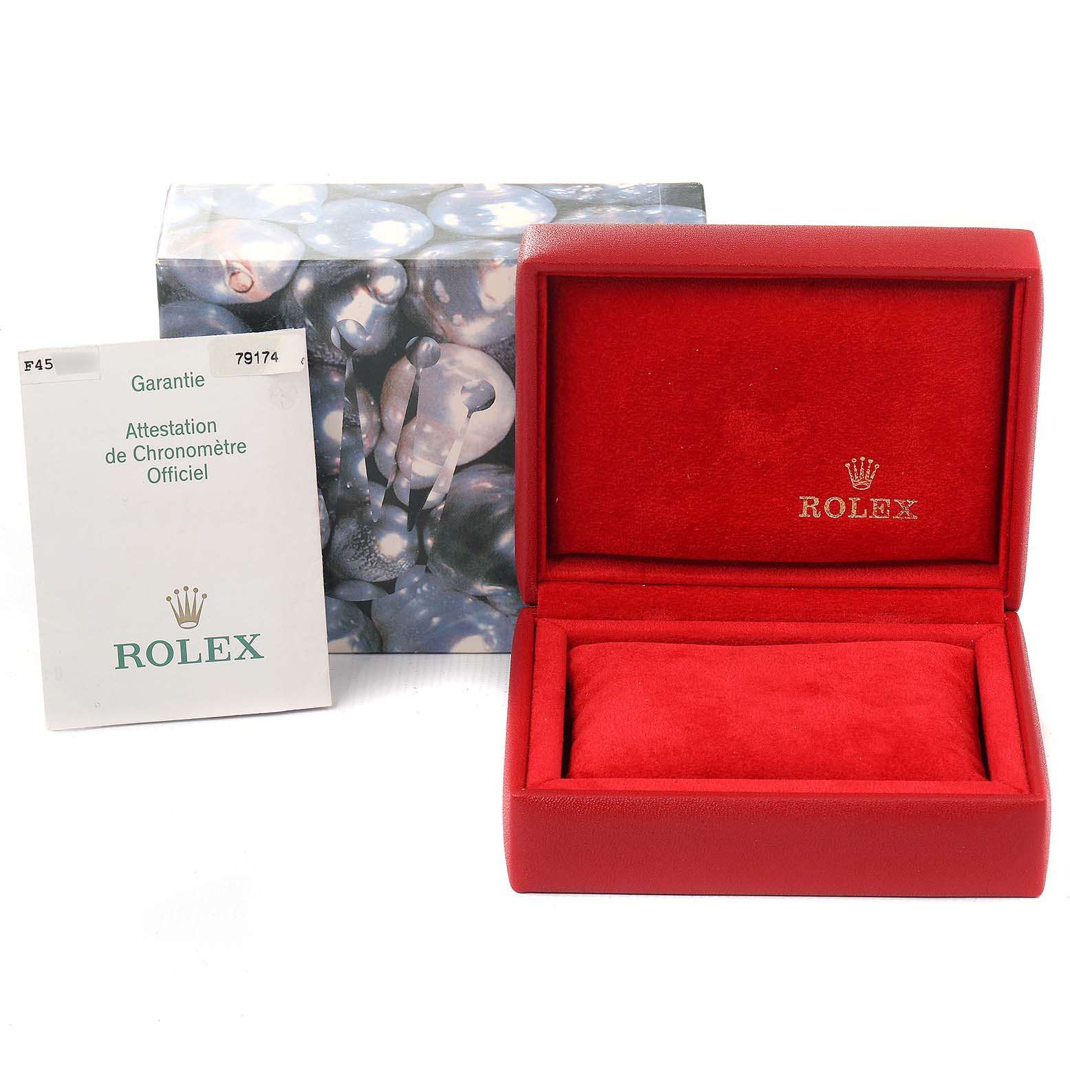 The image shows a Rolex Datejust 79174 Women's Stainless Steel Mother of Pearl Dial 79174 Women's Stainless Steel Mother of Pearl Dial watch box with a warranty card placed beside it.