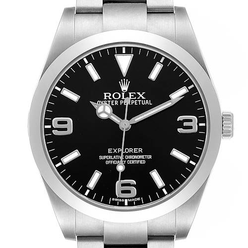 The image shows a frontal view of the Rolex Explorer 214270 Men's Stainless Steel Black Dial watch, highlighting the dial, hands, crown, and part of the bracelet.