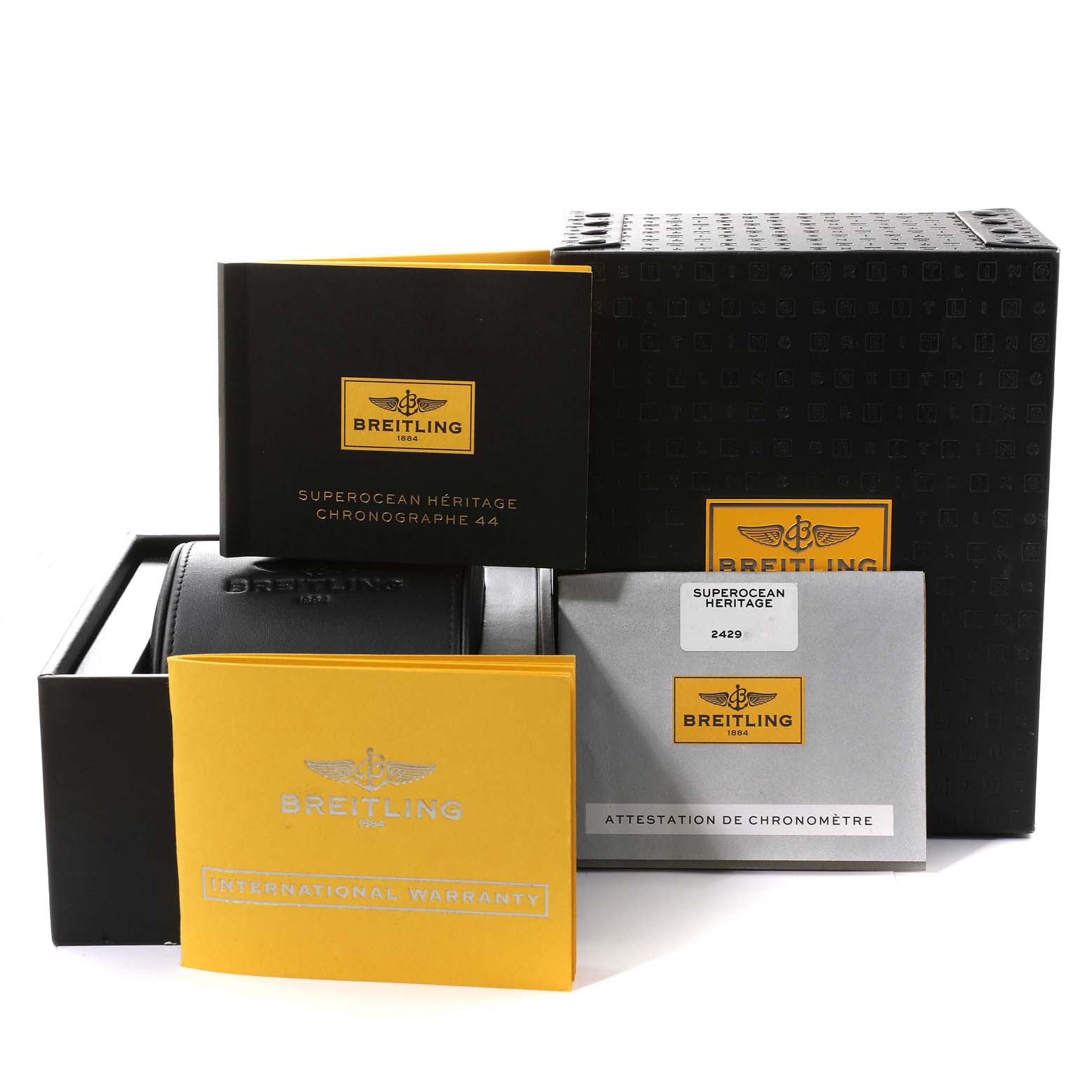 The image shows the box, warranty cards, and documentation for the Breitling Superocean A23370 Men's Stainless Steel Silver Dial A23370 Men's Stainless Steel Silver Dial model, viewed at a slight angle.