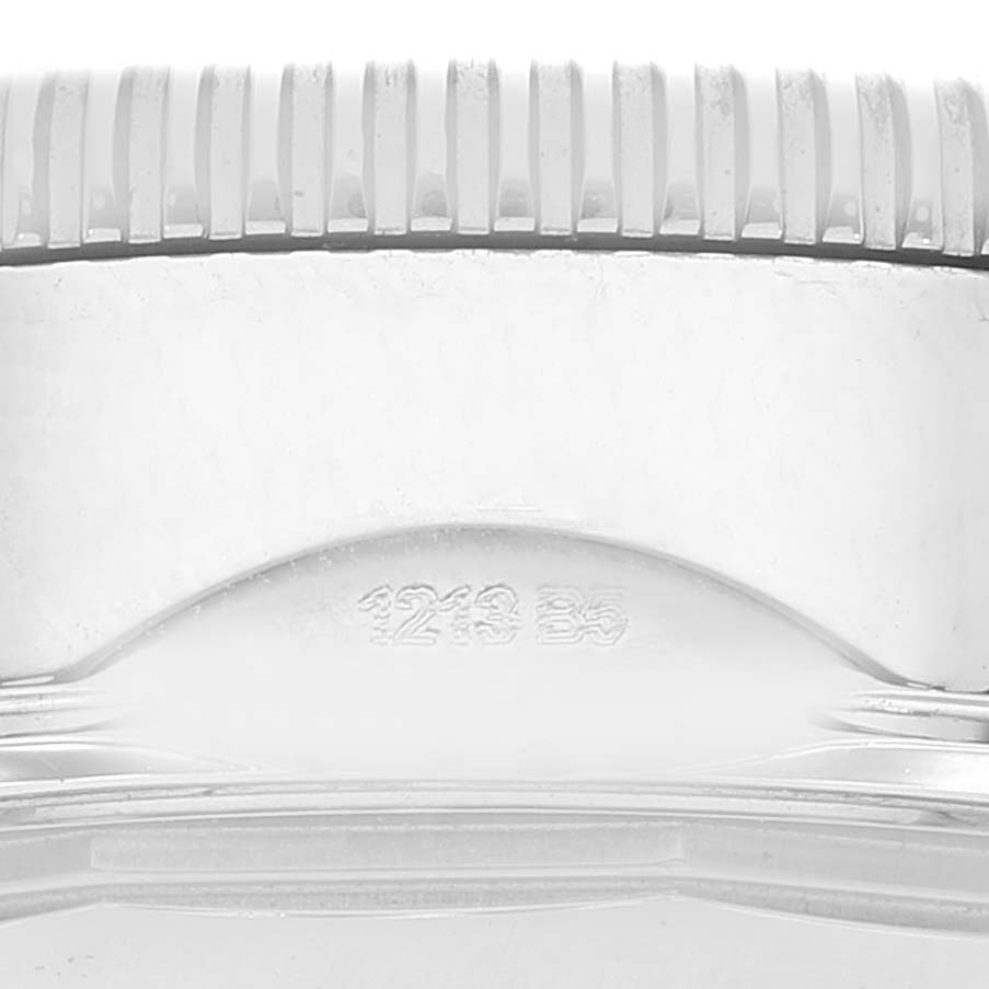 The image shows a close-up of the case back and part of the bezel of the Breitling Superocean A23370 Men's Stainless Steel Silver Dial A23370 Men's Stainless Steel Silver Dial model.