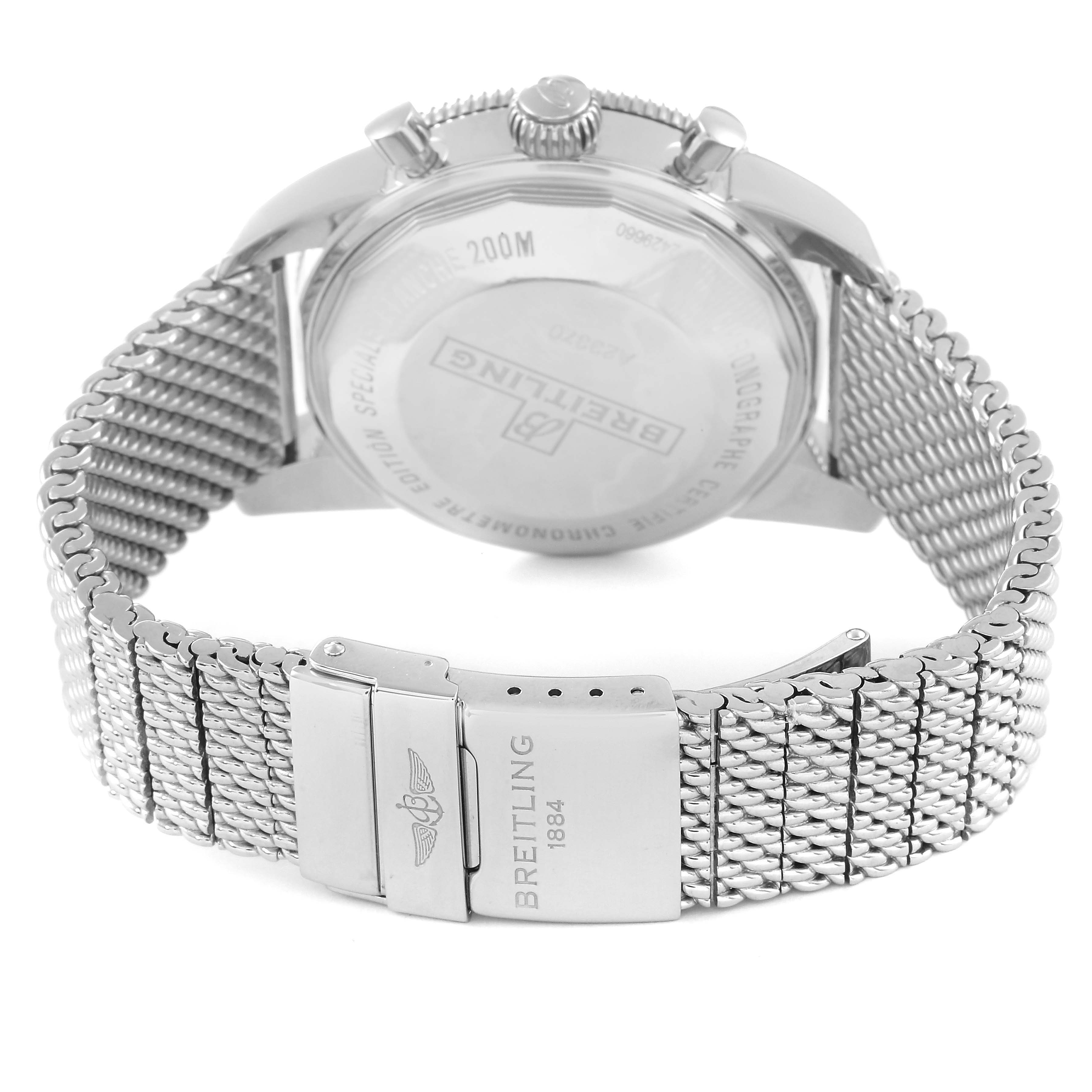 The image shows the back view of a Breitling Superocean A23370 Men's Stainless Steel Silver Dial A23370 Men's Stainless Steel Silver Dial watch and its metal mesh strap.