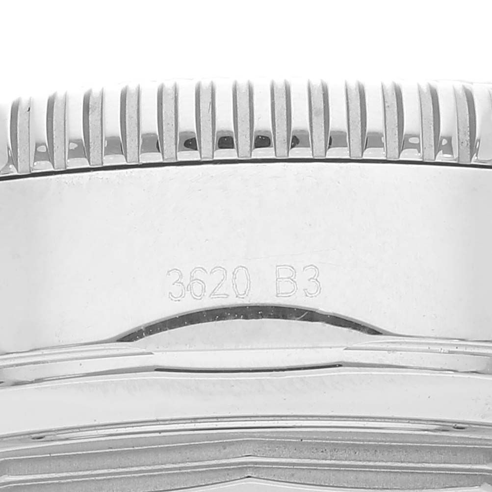 This image shows the side view of the bezel and case of a Breitling Superocean AB0162 Men's Stainless Steel Silver Dial AB0162 Men's Stainless Steel Silver Dial watch, highlighting its ridged edges and engraving.