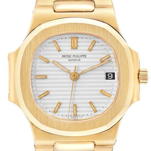 The image shows a close-up of the face and part of the bracelet of the Patek Philippe Nautilus 3800/1J Men's Yellow Gold White Dial 3800/1J Men's Yellow Gold White Dial watch.