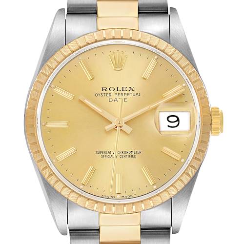 The Rolex Date 15223 Men's Steel and Gold (two tone) Champagne Dial model watch is shown from a front angle, displaying the dial, bezel, and part of the bracelet.