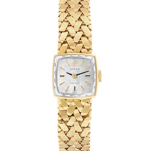 The Rolex Cocktail 8298 Women's Yellow Gold Silver Dial watch is shown from a top-down angle, highlighting its gold case, silver dial, and textured bracelet.