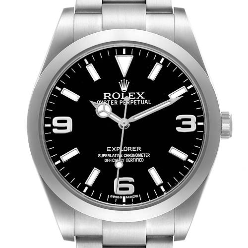 The Rolex Explorer 214270 Men's Stainless Steel Black Dial watch is shown from the front, displaying the dial, hands, indices, case, and part of the bracelet.