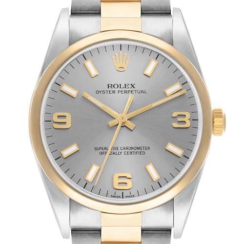 The Rolex Oyster Perpetual 14203 Men's Steel and Gold (two tone) Silver Dial watch is shown head-on, highlighting the dial, bezel, crown, and part of the bracelet.