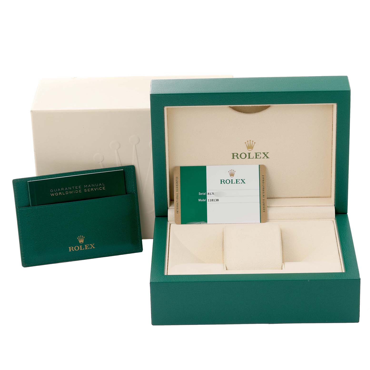 The image shows the packaging, including the box, guarantee manual, and warranty card for a Rolex President 118138 Men's Yellow Gold Green Dial 118138 Men's Yellow Gold Green Dial model watch.