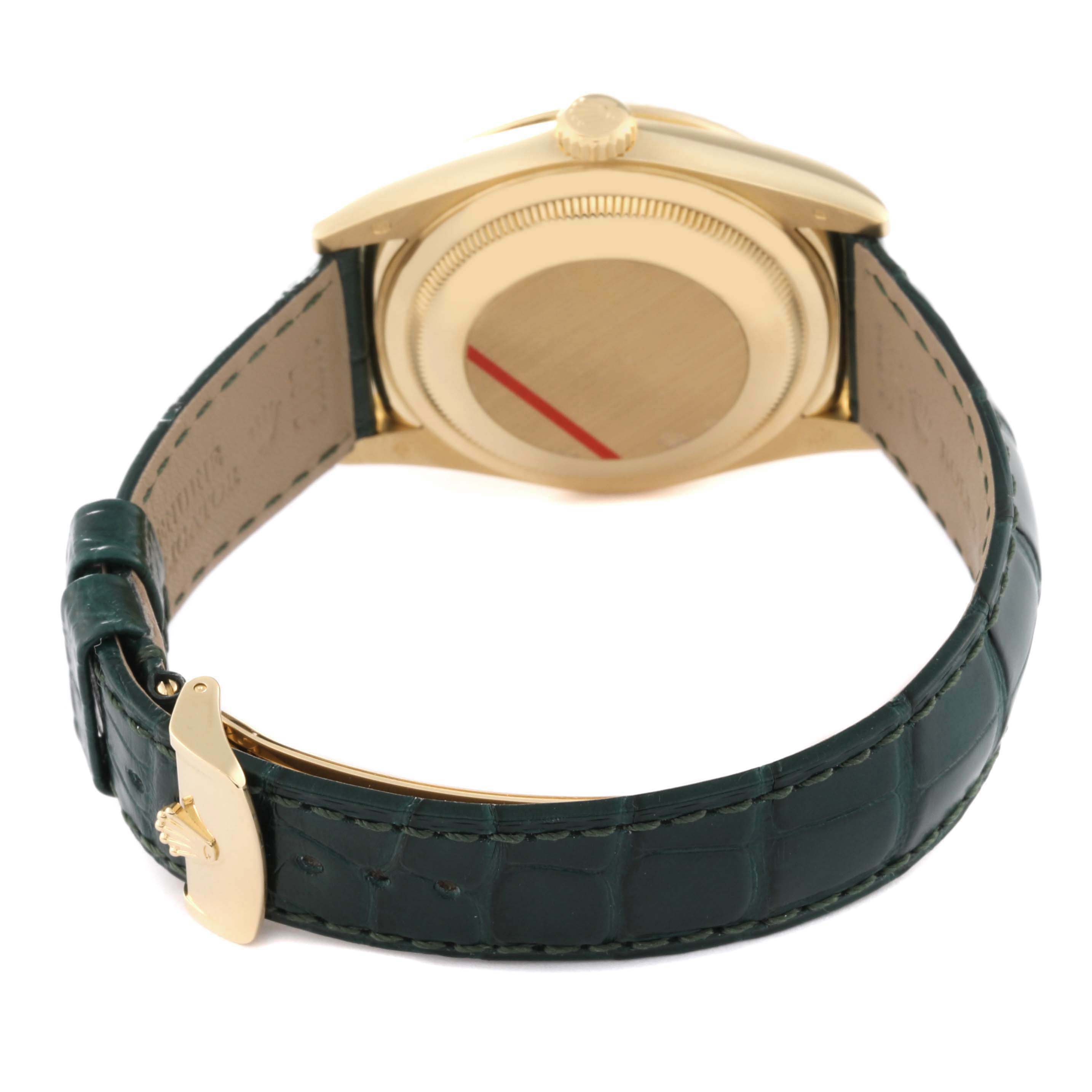 This image shows the rear view of a Rolex President 118138 Men's Yellow Gold Green Dial 118138 Men's Yellow Gold Green Dial model watch, including its green leather strap and gold-toned back case.