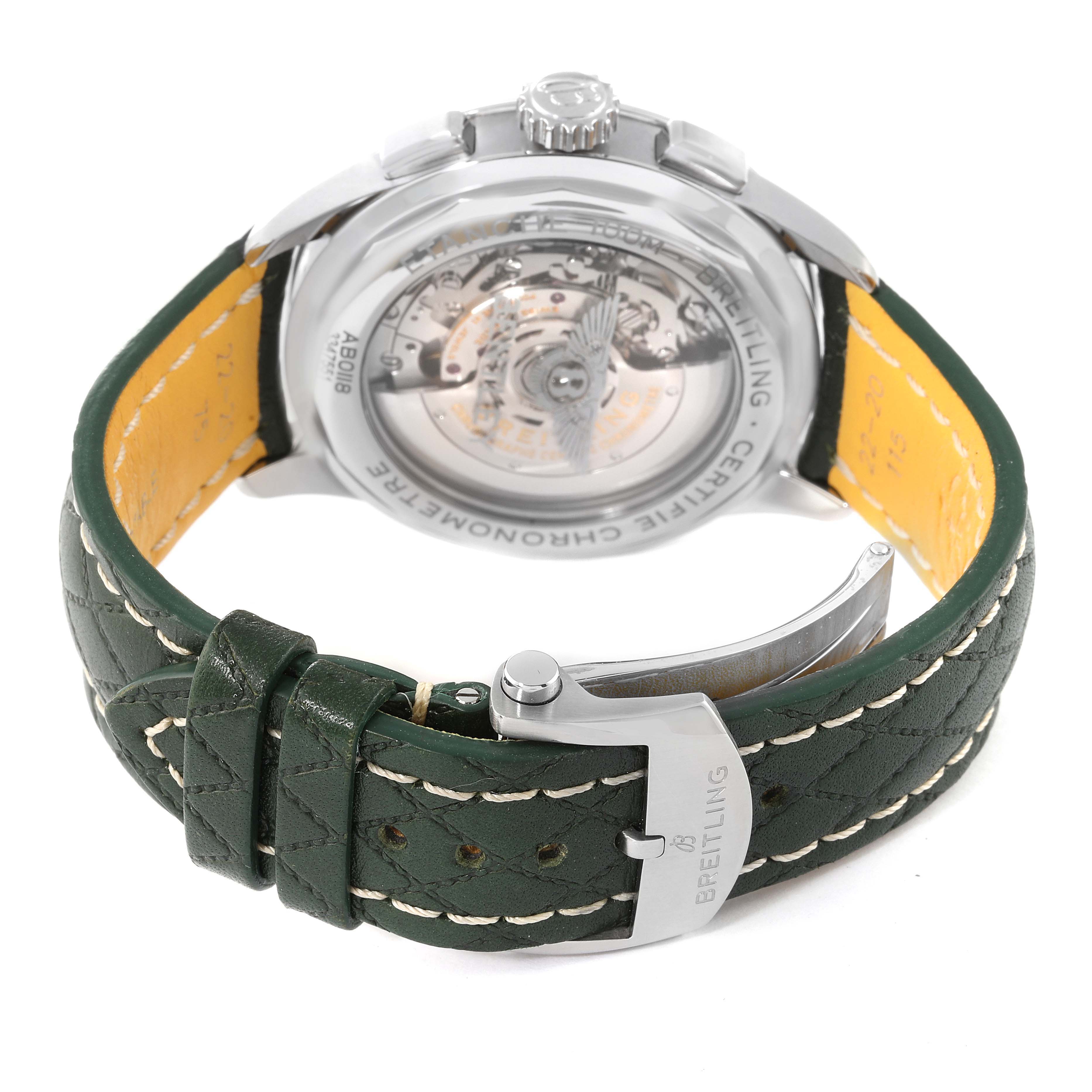 The image shows the back view of a Breitling Premier AB0118 Men's Stainless Steel Green Dial AB0118 Men's Stainless Steel Green Dial watch, highlighting its green leather strap and the exhibition case back.