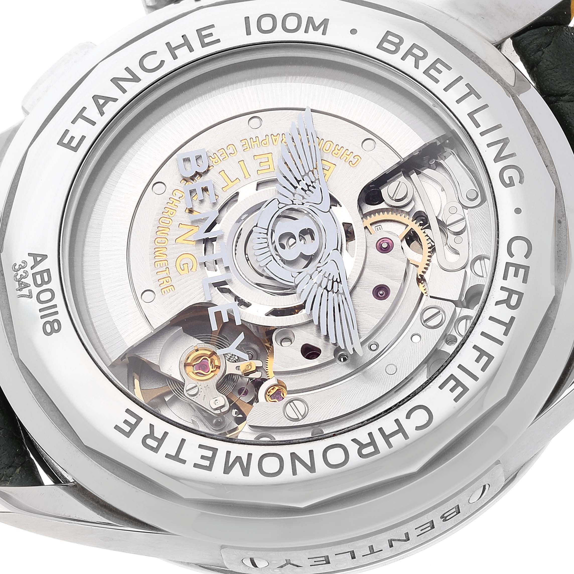 The image shows the open case back of a Breitling Premier AB0118 Men's Stainless Steel Green Dial AB0118 Men's Stainless Steel Green Dial model, revealing the intricate mechanism inside.