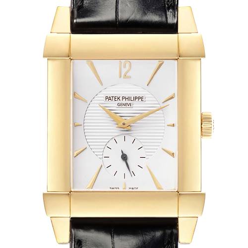 The Patek Philippe Gondolo 5111J-001 Men's Yellow Gold Silver Dial watch is shown from a front angle, highlighting its rectangular gold case, dial, and black leather strap.