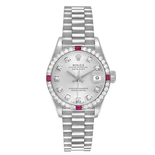 The Rolex President 69069 Women's White Gold Silver Dial model is shown from a top-down angle, displaying the face, bezel, and part of the bracelet.