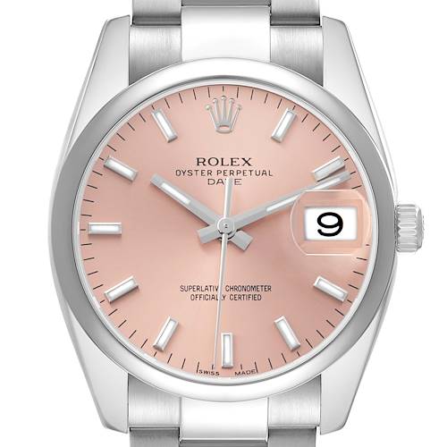 The Rolex Date 115200 Men's Stainless Steel Pink Dial model watch is shown from the front, highlighting its pink dial, hour markers, hands, and date magnifier.