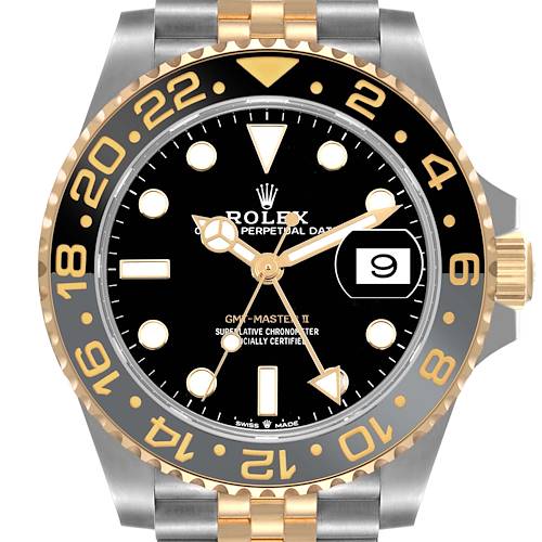 The image shows a straight-on view of a Rolex GMT-Master 126713 Men's Steel and Gold (two tone) Black Dial 126713 Men's Steel and Gold (two tone) Black Dial II watch, highlighting the bezel, dial, hands, date window, and part of the bracelet.