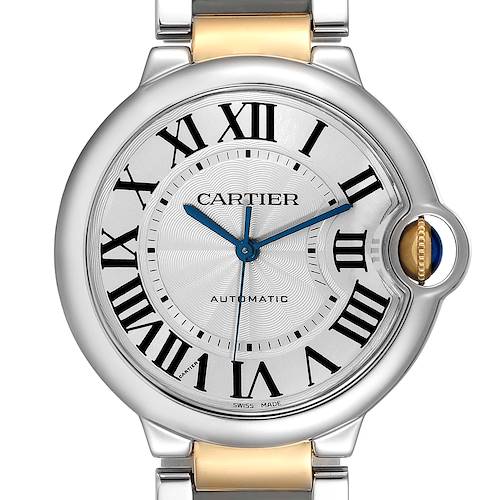 The image shows a front view of the Cartier Ballon Bleu W6920047 Women's Steel and Gold (two tone) Silver Dial W6920047 Women's Steel and Gold (two tone) Silver Dial watch, highlighting its dial, Roman numerals, and blue hands.