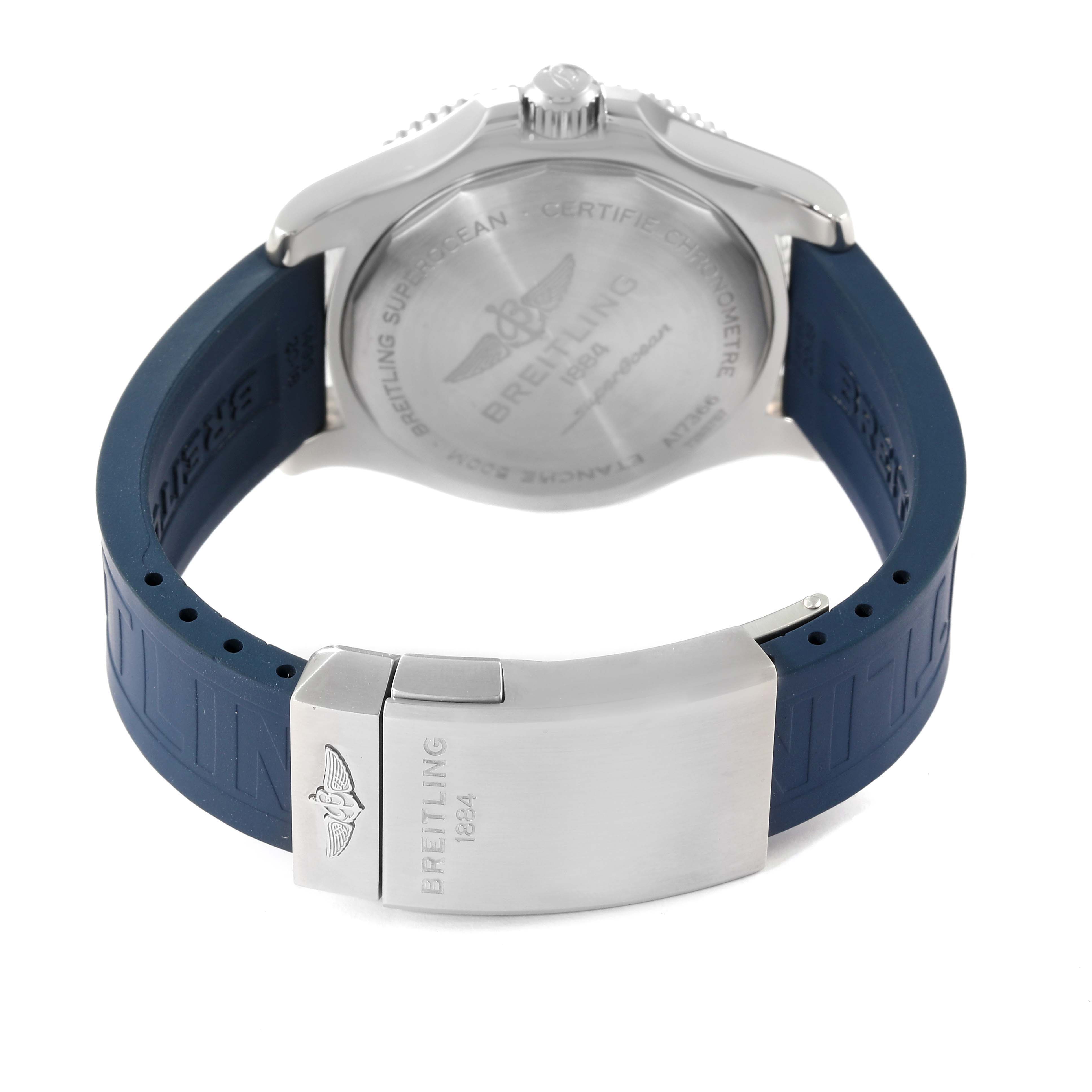 The image shows the back view of a Breitling Superocean A17366 Men's Stainless Steel Blue Dial A17366 Men's Stainless Steel Blue Dial watch, focusing on the case back and the clasp of the blue rubber strap.